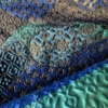 Jacquard patchwork blu verde e oro