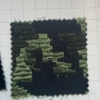 Jacquard camouflage pixel nero e verde