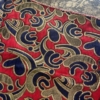 Jacquard fiore decò regimental rosso blu e oro